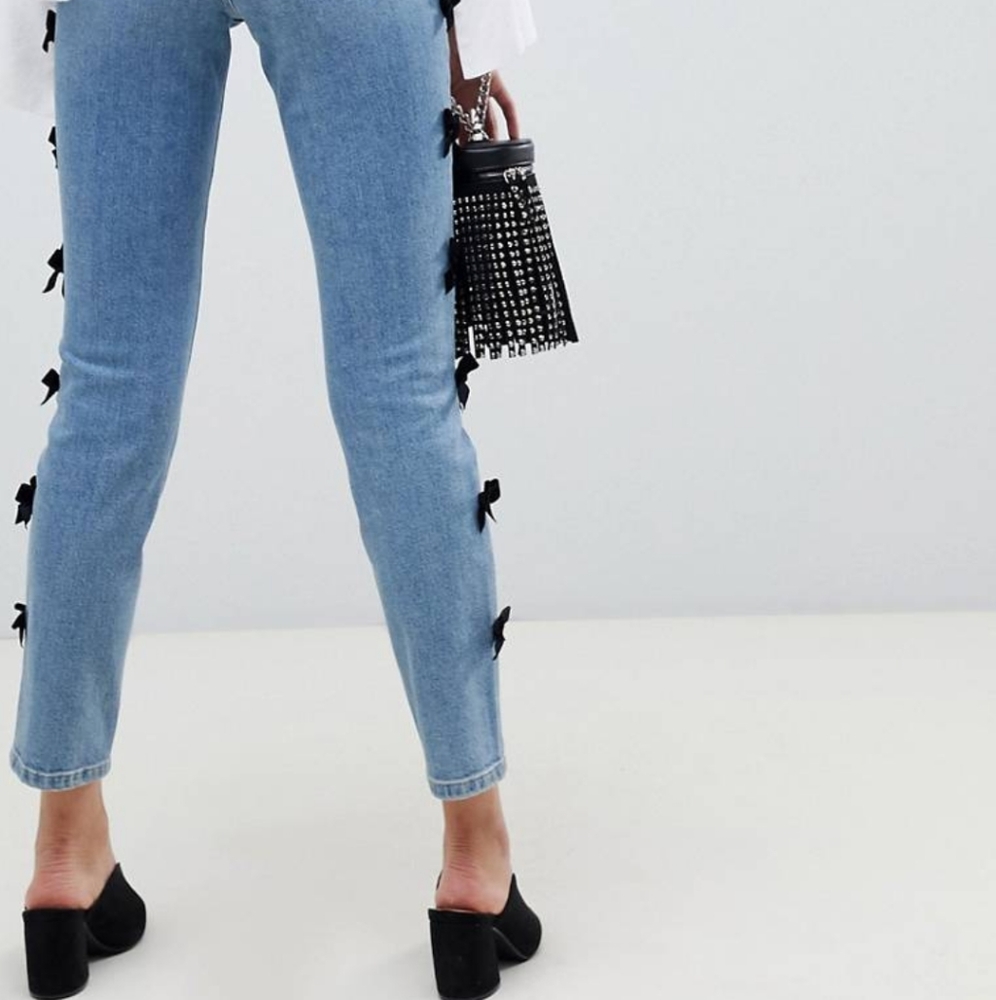 High waist jeans with bow detail